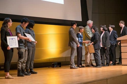 Carole Ratcliffe presents MICA awardees